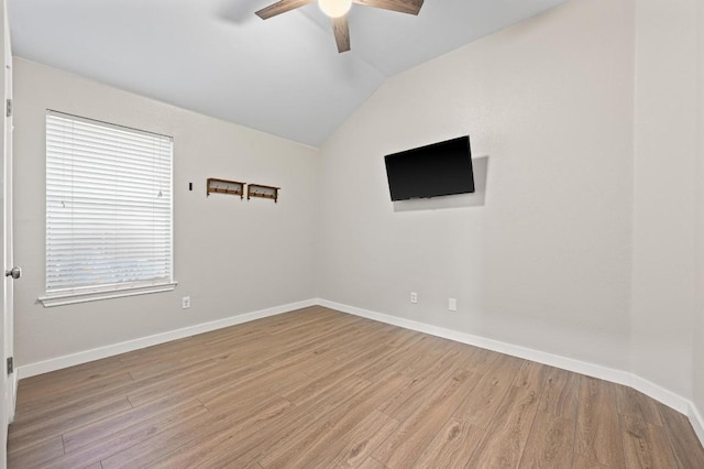 101 Desert Highlands Trl, Round Rock, TX 78665 - spare room featuring ceiling fan, lofted ceiling, and wood finished floors
