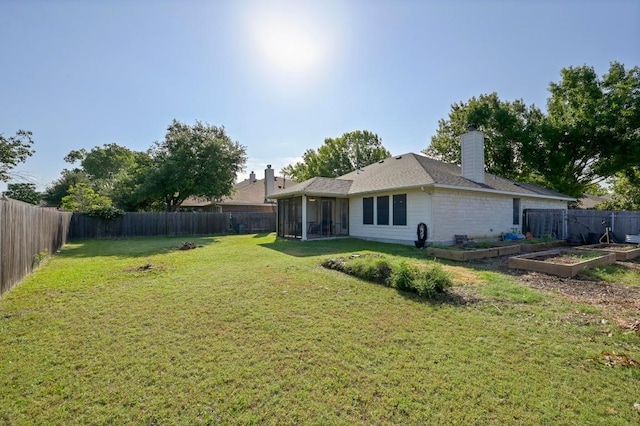 101 Desert Highlands Trl, Round Rock, TX 78665 - rear view of house featuring a garden, a fenced backyard, a sunroom, and a chimney