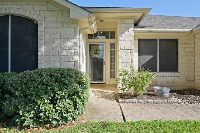 101 Desert Highlands Trl, Round Rock, TX 78665 - doorway to property with stone siding and a shingled roof