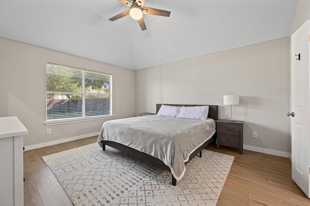 101 Desert Highlands Trl, Round Rock, TX 78665 - bedroom with wood finished floors, lofted ceiling, and a ceiling fan