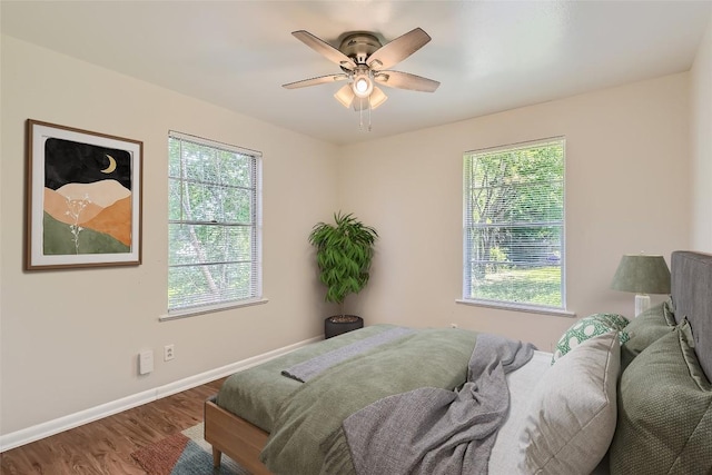 4805 Hilldale Dr, Austin, TX 78723 - bedroom featuring wood finished floors and ceiling fan