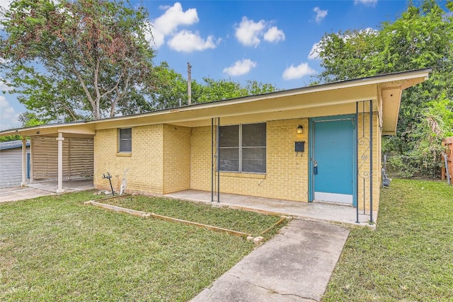 4805 Hilldale Dr, Austin, TX 78723 - ranch-style home with a front lawn and brick siding