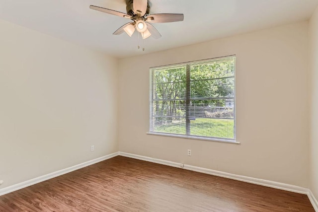 4805 Hilldale Dr, Austin, TX 78723 - empty room featuring wood finished floors and ceiling fan