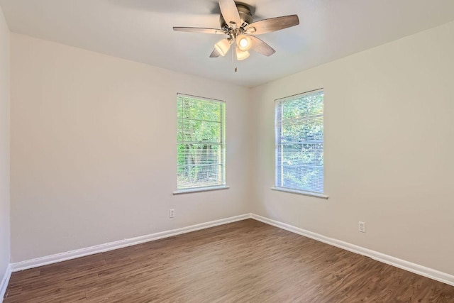 4805 Hilldale Dr, Austin, TX 78723 - unfurnished room with dark wood-type flooring and ceiling fan