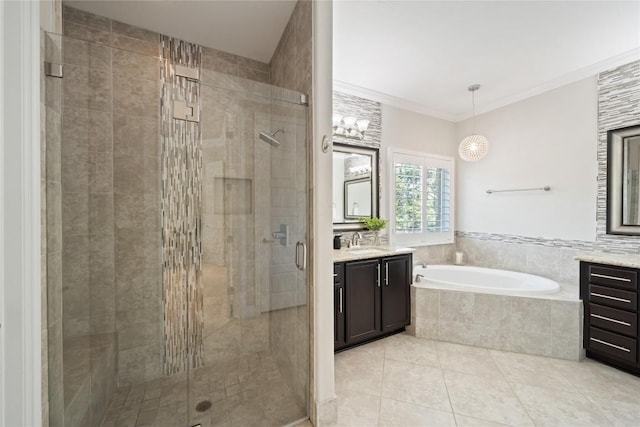 108 Kildrummy Ln, Lakeway, TX 78738 - bathroom with vanity, a garden tub, a shower stall, tile patterned floors, and crown molding