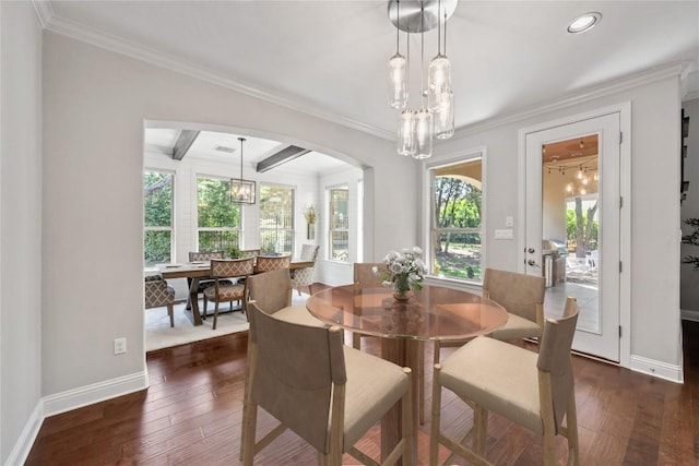 108 Kildrummy Ln, Lakeway, TX 78738 - dining area with crown molding, dark wood-style floors, a chandelier, beam ceiling, and arched walkways