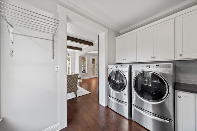 108 Kildrummy Ln, Lakeway, TX 78738 - washroom featuring cabinet space, arched walkways, washer and dryer, and dark wood finished floors