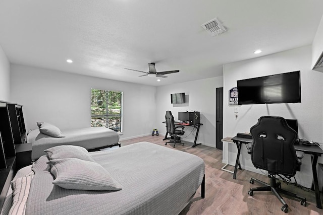 11803 Jess Dr, Austin, TX 78737 - bedroom with a desk, light wood finished floors, ceiling fan, and recessed lighting