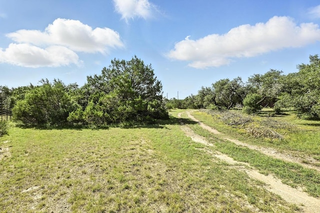 11803 Jess Dr, Austin, TX 78737 - view of grassy yard featuring a rural view