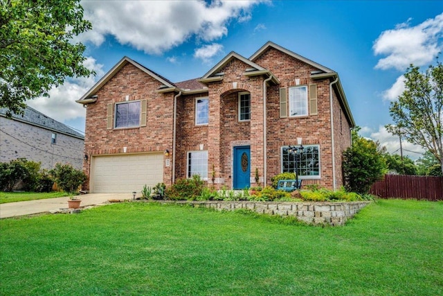 200 S Prairie Ln, Georgetown, TX 78633 - view of front facade with driveway, an attached garage, and brick siding
