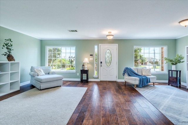 200 S Prairie Ln, Georgetown, TX 78633 - entryway featuring hardwood / wood-style floors and ornamental molding