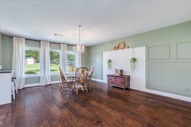 200 S Prairie Ln, Georgetown, TX 78633 - dining room with hardwood / wood-style flooring and a chandelier