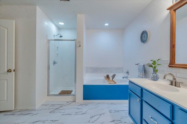 200 S Prairie Ln, Georgetown, TX 78633 - bathroom with a shower stall, vanity, a bath, recessed lighting, and marble look tile flooring