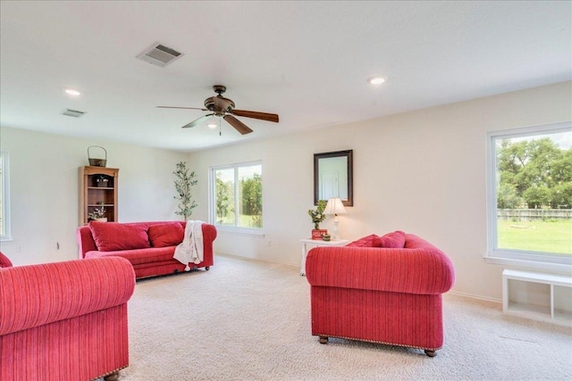 200 S Prairie Ln, Georgetown, TX 78633 - living area with light carpet, plenty of natural light, ceiling fan, and recessed lighting