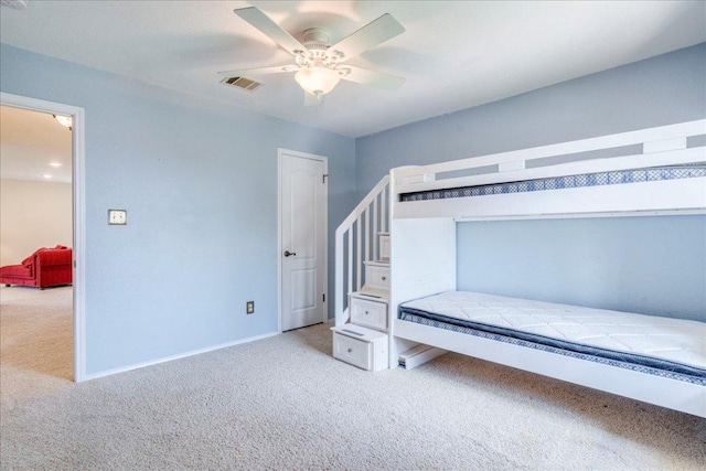 200 S Prairie Ln, Georgetown, TX 78633 - unfurnished bedroom featuring light colored carpet and a ceiling fan