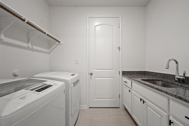 2541 Reunion Blvd, Austin, TX 78737 - washroom featuring washer and dryer and cabinet space