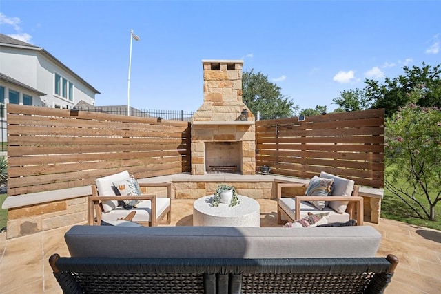 2541 Reunion Blvd, Austin, TX 78737 - view of patio / terrace with an outdoor living space with a fireplace
