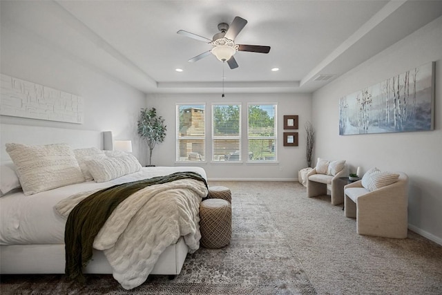 2541 Reunion Blvd, Austin, TX 78737 - carpeted bedroom featuring a raised ceiling, a ceiling fan, and recessed lighting