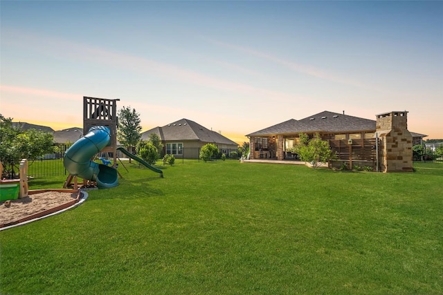 2541 Reunion Blvd, Austin, TX 78737 - yard at dusk featuring a playground
