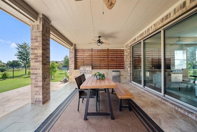 2541 Reunion Blvd, Austin, TX 78737 - view of patio featuring ceiling fan, exterior kitchen, and outdoor dining space