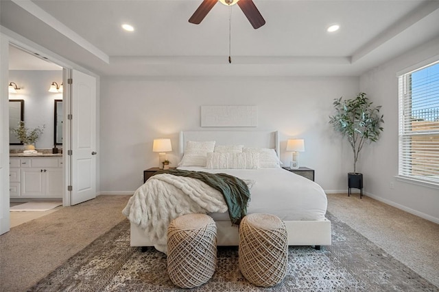 2541 Reunion Blvd, Austin, TX 78737 - bedroom with light colored carpet, a raised ceiling, ensuite bath, recessed lighting, and ceiling fan
