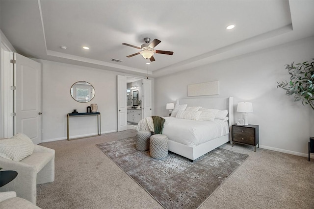 2541 Reunion Blvd, Austin, TX 78737 - bedroom with a tray ceiling, carpet, recessed lighting, ensuite bathroom, and ceiling fan