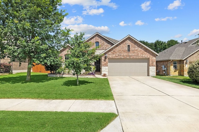 2977 Diego Dr, Round Rock, TX 78665 - view of front of property with an attached garage, brick siding, concrete driveway, and stone siding