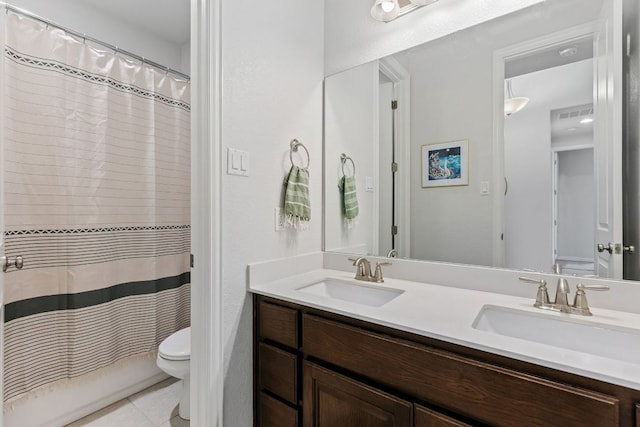 2977 Diego Dr, Round Rock, TX 78665 - bathroom featuring double vanity, tile patterned floors, and curtained shower
