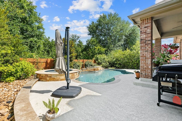 2977 Diego Dr, Round Rock, TX 78665 - view of swimming pool with a fenced backyard, a pool with connected hot tub, and a patio area