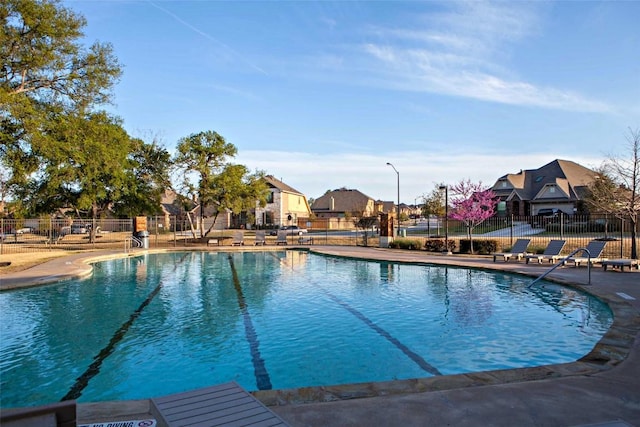 2977 Diego Dr, Round Rock, TX 78665 - community pool with a residential view and a patio