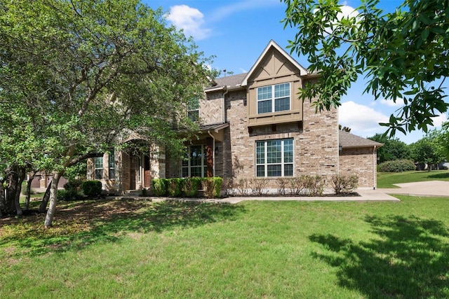 201 Montalcino Blvd, Austin, TX 78734 - view of front of house with a front yard and brick siding
