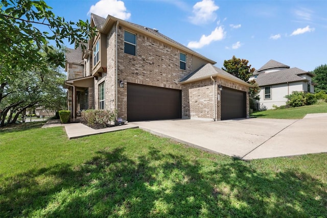 201 Montalcino Blvd, Austin, TX 78734 - view of front of home featuring brick siding, a front yard, and driveway