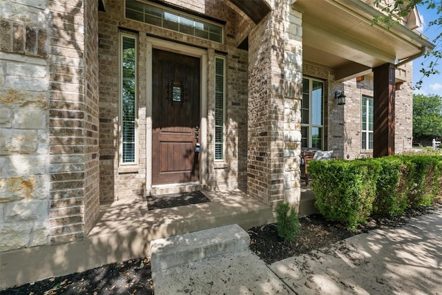 201 Montalcino Blvd, Austin, TX 78734 - view of exterior entry with brick siding and covered porch