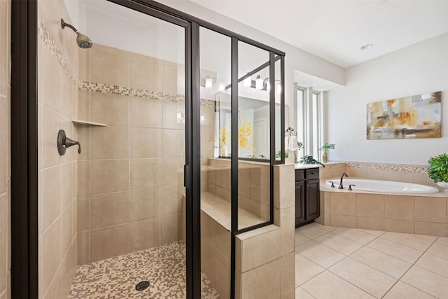 201 Montalcino Blvd, Austin, TX 78734 - full bathroom with a shower stall, a bath, tile patterned flooring, and vanity