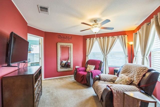 6401 Quinton Dr, Austin, TX 78747 - sitting room with a ceiling fan and light carpet