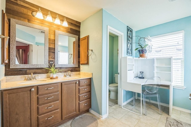6401 Quinton Dr, Austin, TX 78747 - full bath featuring toilet and double vanity