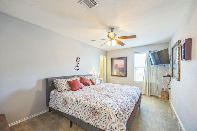 6401 Quinton Dr, Austin, TX 78747 - carpeted bedroom featuring baseboards and ceiling fan