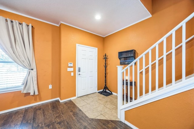6401 Quinton Dr, Austin, TX 78747 - entrance foyer featuring crown molding, wood finished floors, and recessed lighting