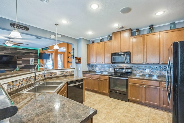 6401 Quinton Dr, Austin, TX 78747 - kitchen with black appliances, backsplash, pendant lighting, ceiling fan, and ornamental molding
