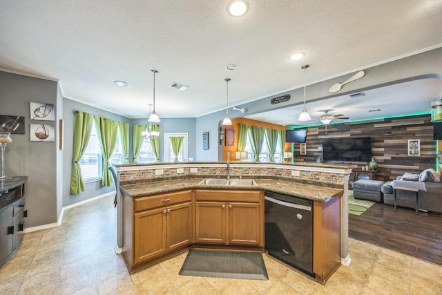 6401 Quinton Dr, Austin, TX 78747 - kitchen with black dishwasher, open floor plan, brown cabinetry, stone counters, and ceiling fan