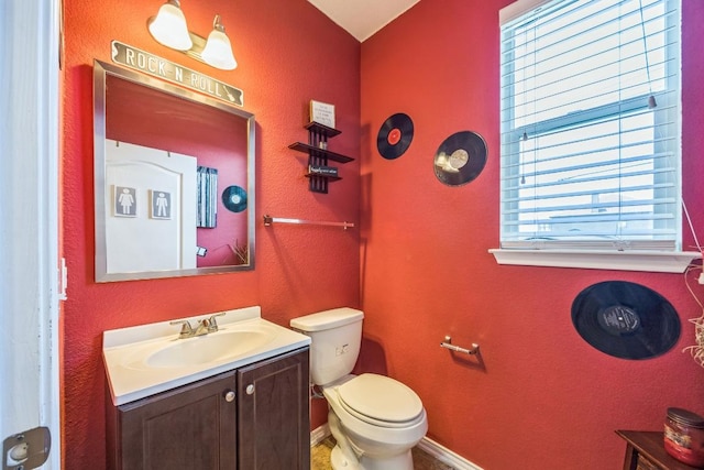 6401 Quinton Dr, Austin, TX 78747 - half bathroom with vanity and toilet