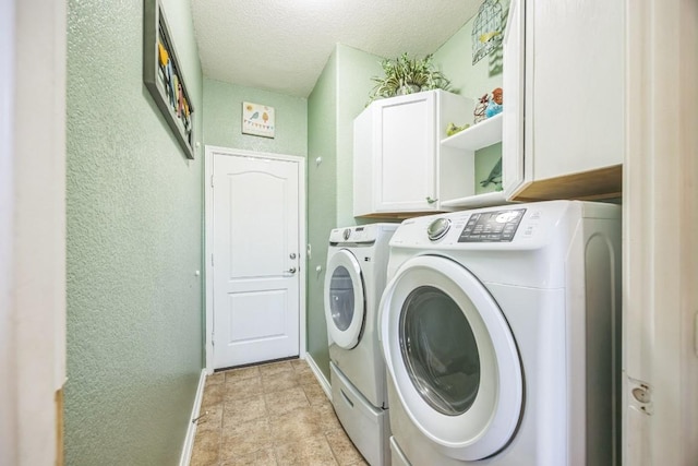 6401 Quinton Dr, Austin, TX 78747 - washroom with cabinet space, washing machine and dryer, a textured wall, and a textured ceiling