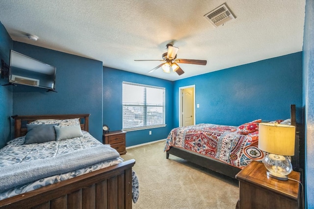 6401 Quinton Dr, Austin, TX 78747 - carpeted bedroom with a textured ceiling and ceiling fan