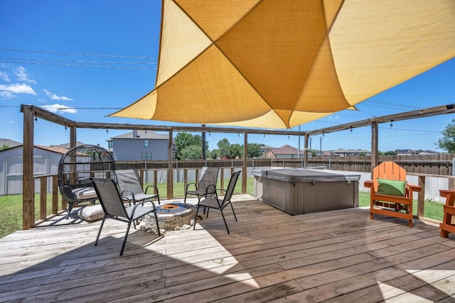 6401 Quinton Dr, Austin, TX 78747 - deck featuring a hot tub, a fire pit, and a fenced backyard