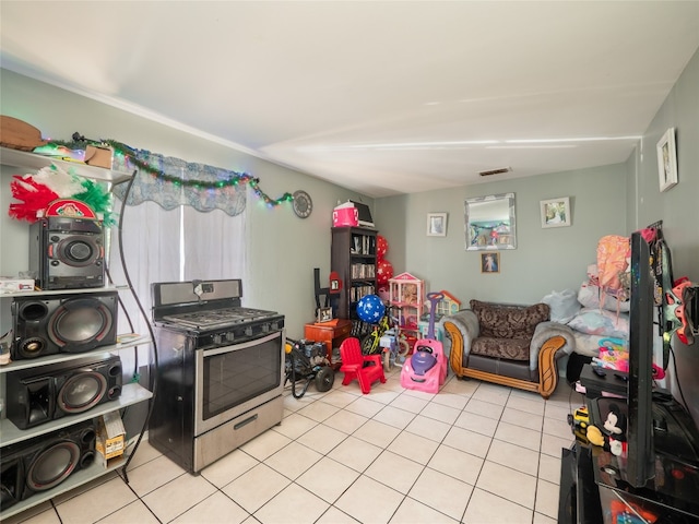 8508 Dryfield Dr, Austin, TX 78758 - rec room with light tile patterned floors