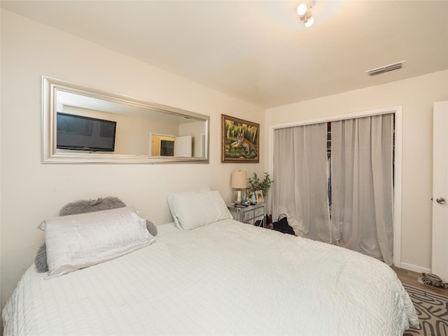 8508 Dryfield Dr, Austin, TX 78758 - bedroom featuring a closet and wood finished floors