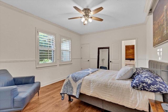 14417 Heron Bay Cv, Bee Cave, TX 78738 - bedroom with wood finished floors, crown molding, a ceiling fan, and ensuite bathroom
