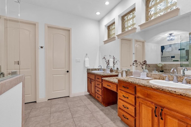 14417 Heron Bay Cv, Bee Cave, TX 78738 - bathroom with double vanity, a stall shower, tile patterned flooring, and recessed lighting