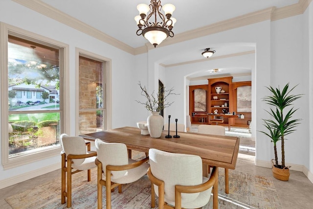 14417 Heron Bay Cv, Bee Cave, TX 78738 - dining room with arched walkways, crown molding, and a chandelier