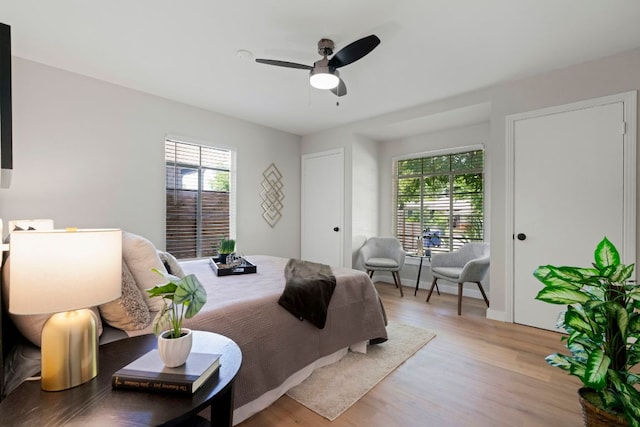 1040 Rosemont St, Austin, TX 78723 - bedroom featuring light wood-style flooring and ceiling fan